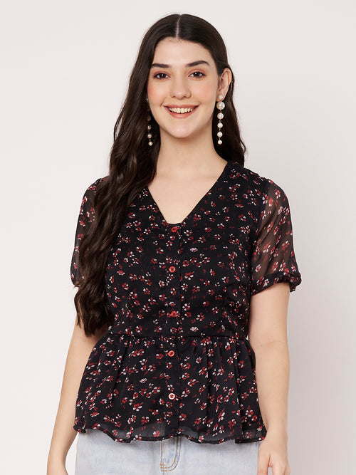 Black floral print peplum top featuring a V-neckline and button-down front.