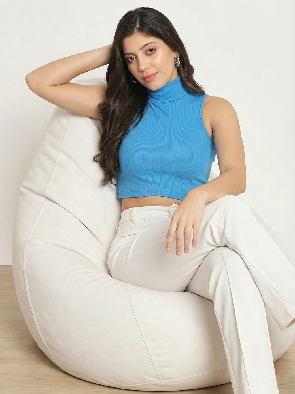 High neck detail on blue sleeveless crop top