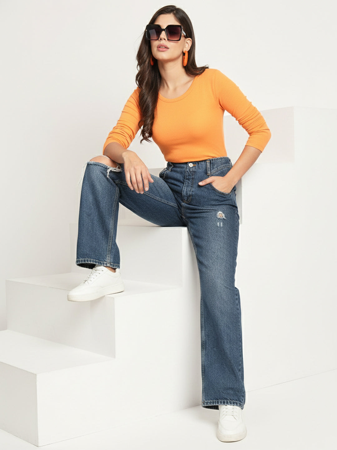 Front view of orange ribbed full sleeve fitted top