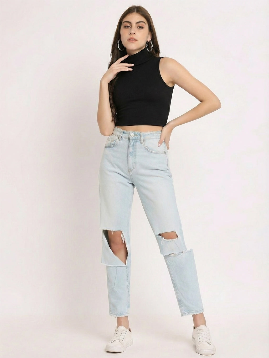 Minimal black sleeveless crop top close-up