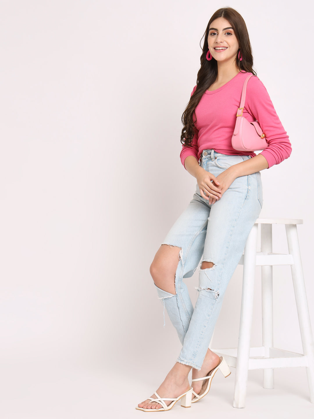 Front view of pink ribbed full sleeve fitted top