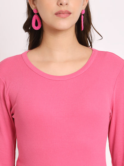 Close-up of ribbed fabric texture in pink top
